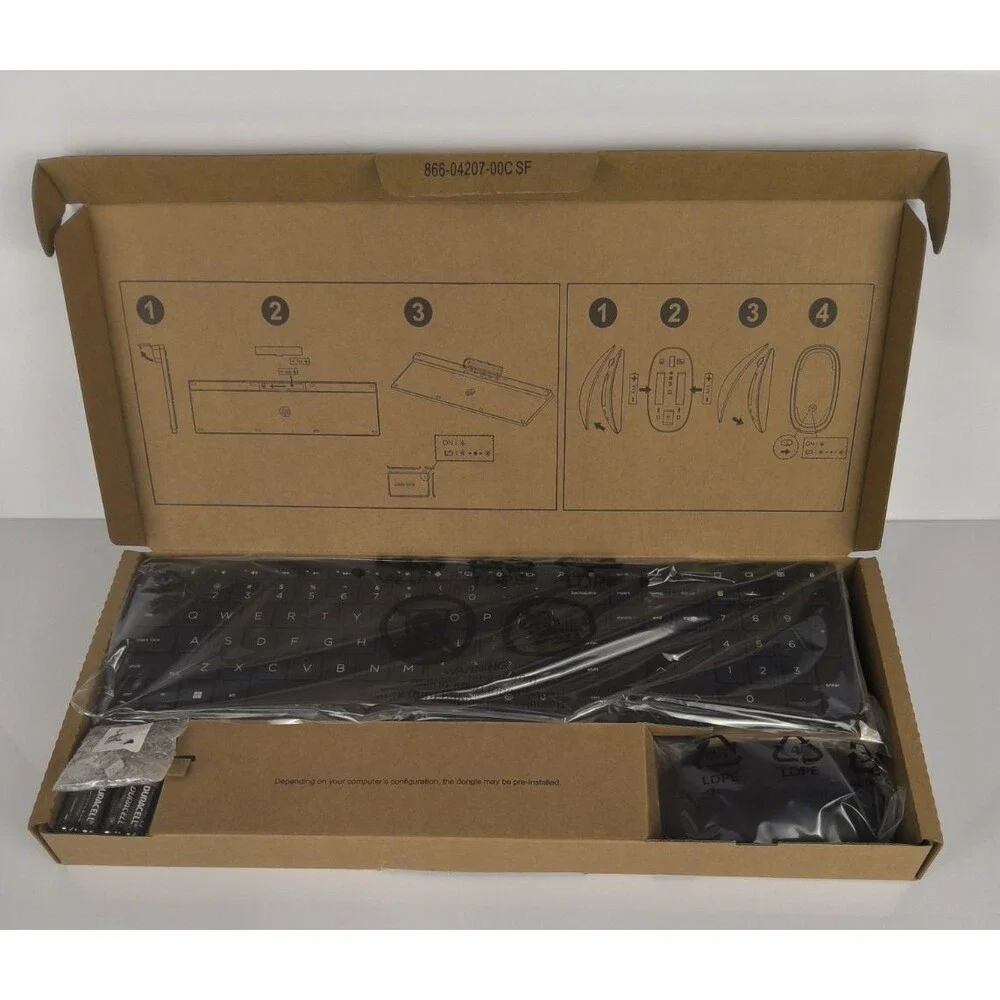 Slim Keyboard and wireless mouse Never used still in box with plastic